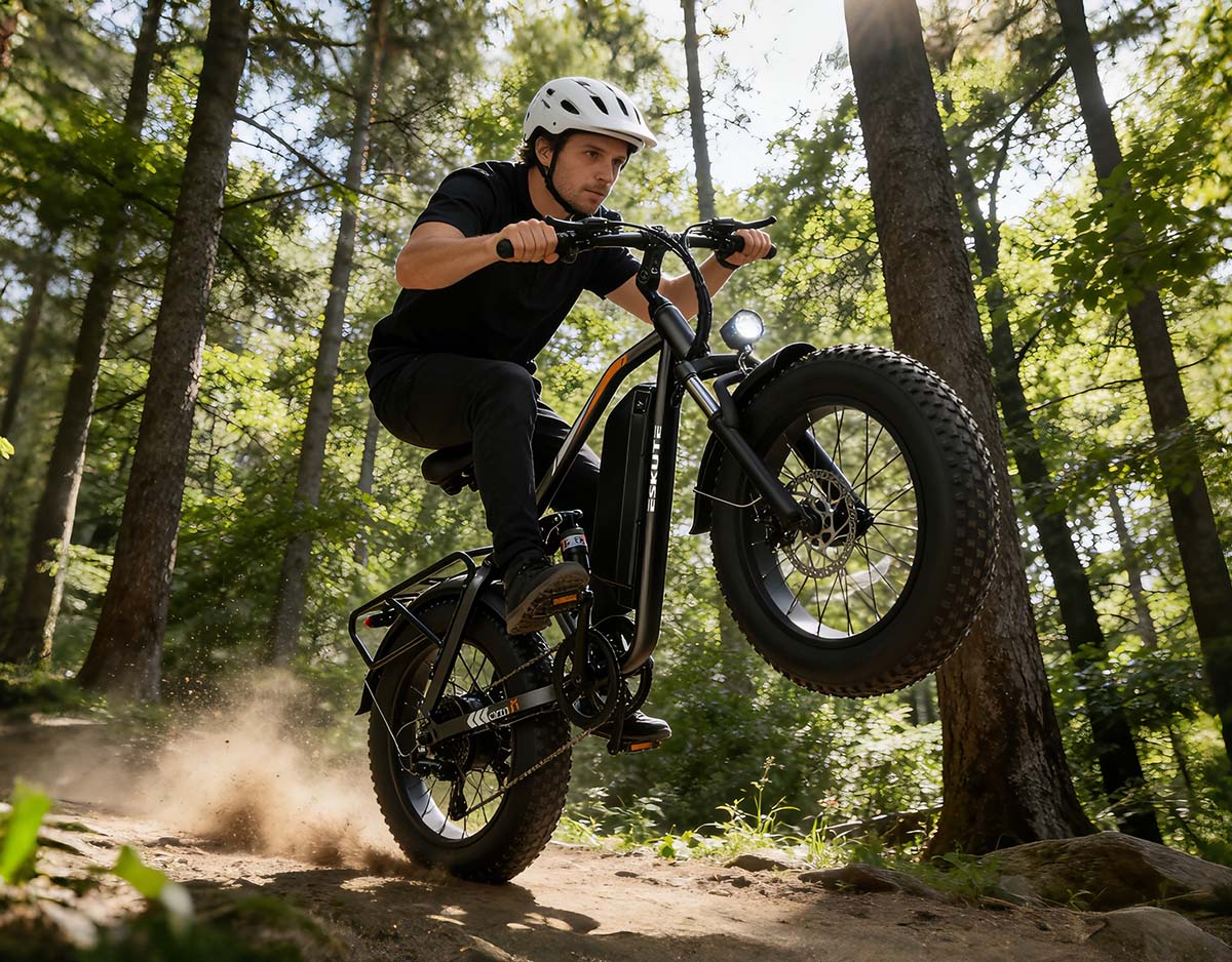 Rider on a fat-tire electric bike on a forest trail